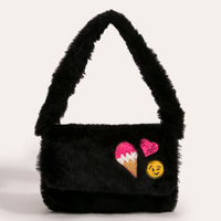 Bolsa infantil de pelúcia com patches preta