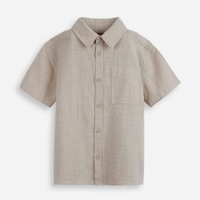Camisa infantil de algodão texturizada com bolso bege