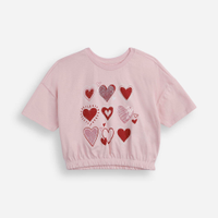 Camiseta infantil de algodão com corações e paetês rosa
