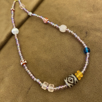 Purple Iridescent Beaded Necklace with Multi-Color Accents