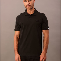 Polo Masculina Calvin Klein Manga Curta Logo Silver Jersey - Preto Polo Masculina Calvin Klein Manga Curta Logo Silver Jersey Preto m