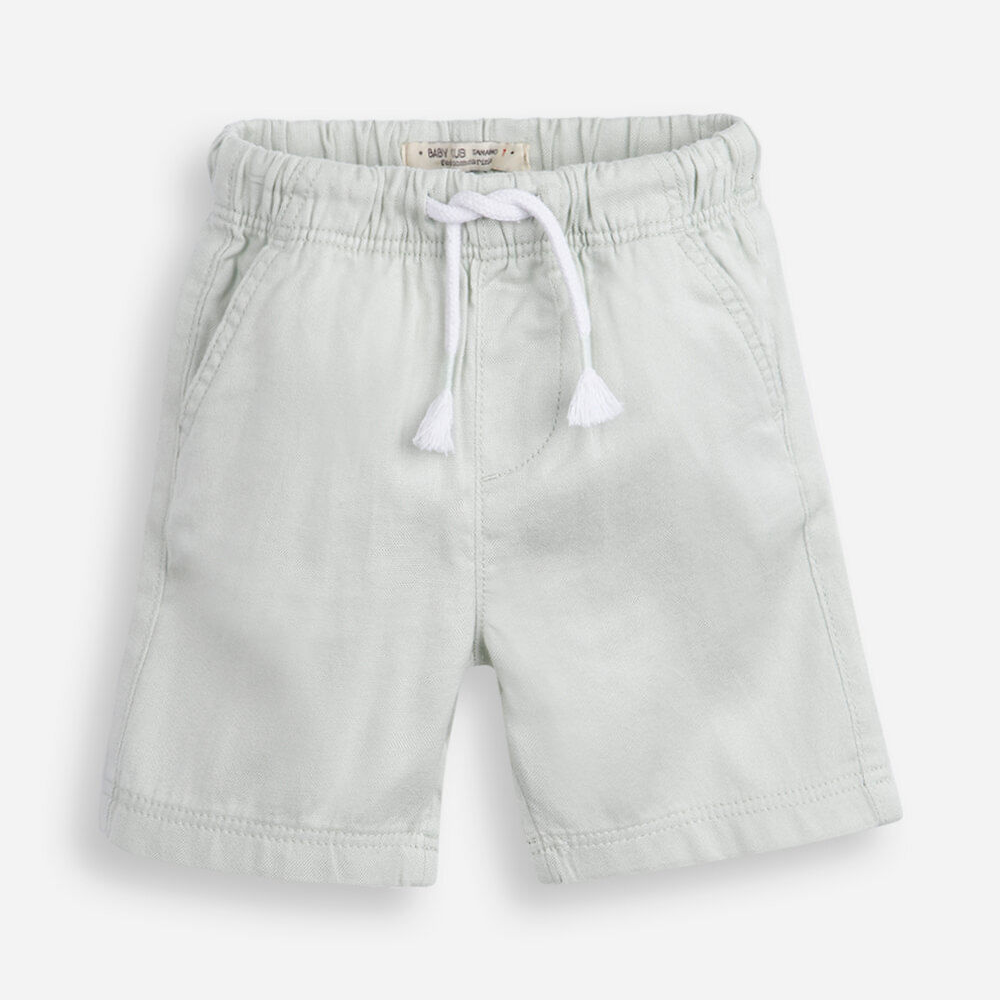 Bermuda infantil de algodão com cós elástico verde Bermuda infantil de algodão com cós elástico verde