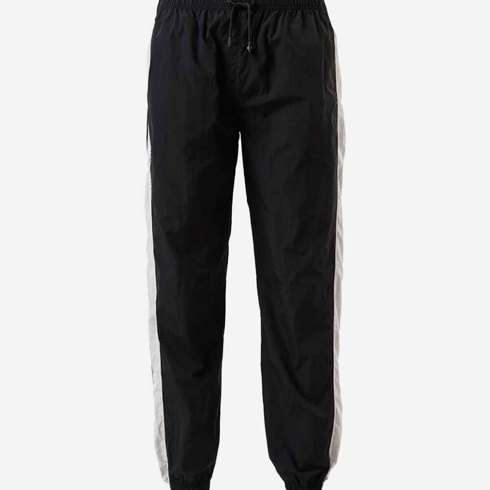 Calça jogger juvenil esportiva de poliamida com recortes preta Calça jogger juvenil esportiva de poliamida com recortes preta