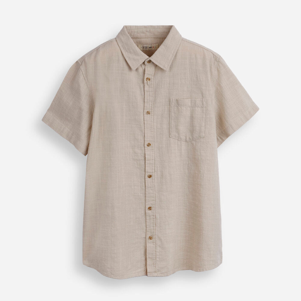 Camisa juvenil de algodão com bolso texturizada bege Camisa juvenil de algodão com bolso texturizada bege