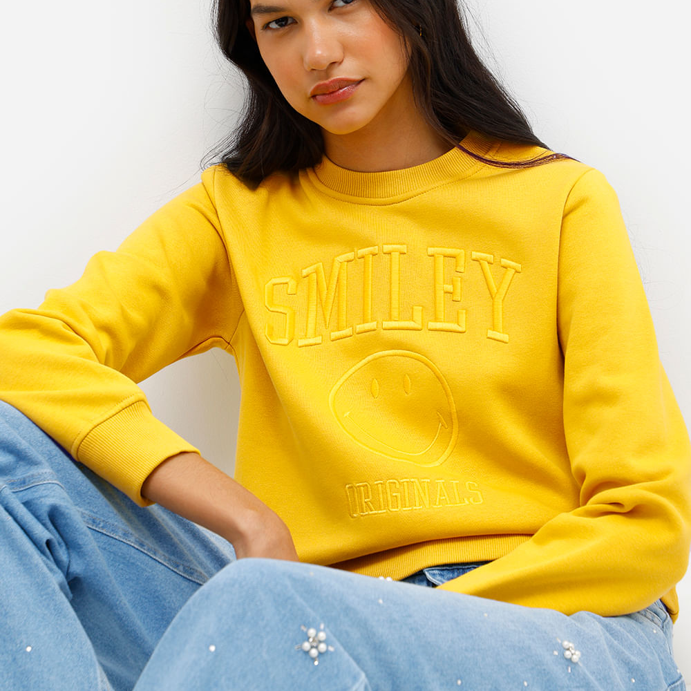 Blusão feminino de moletom felpado com bordado smiley amarelo