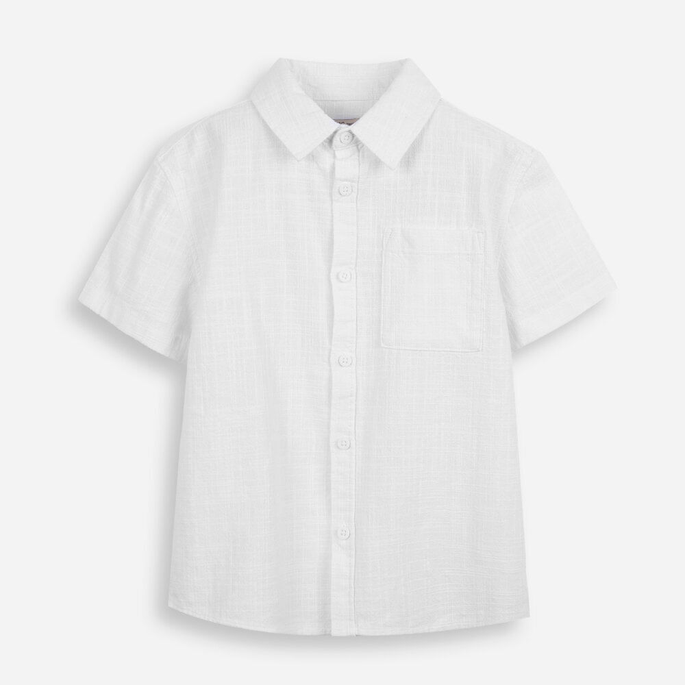 Camisa infantil de algodão texturizada com bolso branco Camisa infantil de algodão texturizada com bolso branco