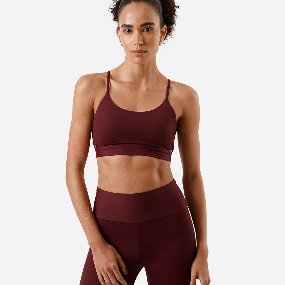 Top feminino esportivo com recortes e bojo removível vinho Top feminino esportivo com recortes e bojo removível vinho