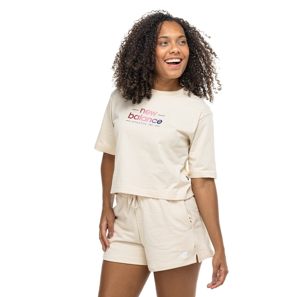 Camiseta New Balance Cropped Reimagined Feminina Camiseta New Balance Cropped Reimagined Feminina