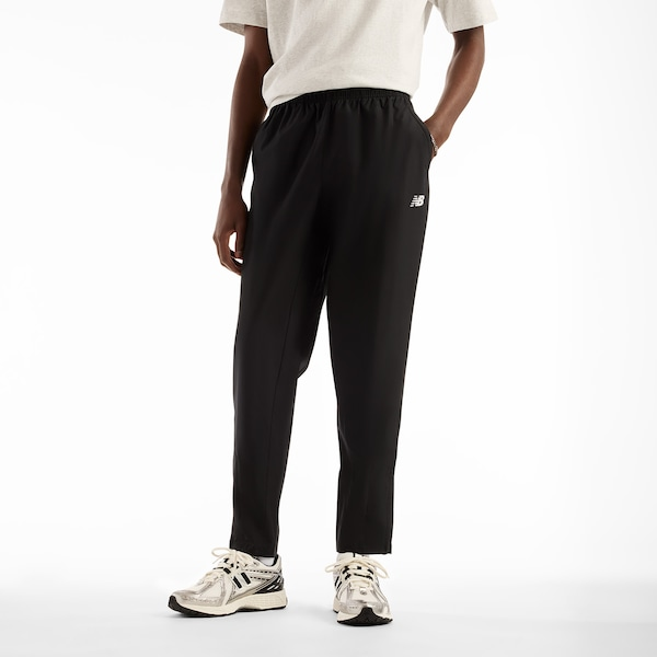 Calça New Balance Utility Woven Masculina Calça New Balance Utility Woven Masculina