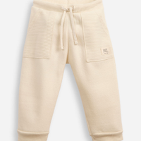Calça de moletom infantil texturizada bege