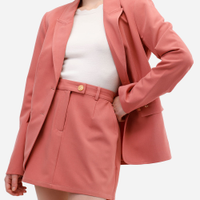 Saia curta feminina de alfaiataria texturizada rosa
