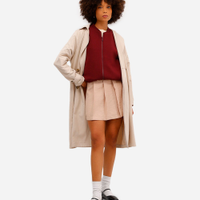 Minissaia feminina de viscose com pregas bege