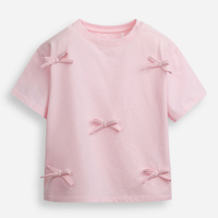 Camiseta infantil de algodão com laços rosa