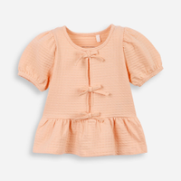 Blusa de algodão infantil com lacinho texturizada laranja