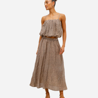 Saia plissada feminina em jacquard floral bege