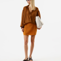 Minissaia feminina de tricot amarela
